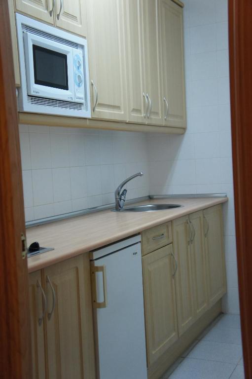Apartamentos Fidalgo Sandiniés Quarto foto